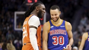 Jae Crowder y Stephen Curry, en un Phoenix Suns - Golden State Warriors