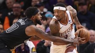 Royce O'Neale, defendiendo a Bradley Beal