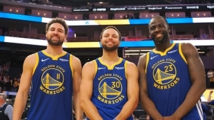 Stephen Curry, Klay Thompson y Draymond Green, jugadores de Golden State Warriors.