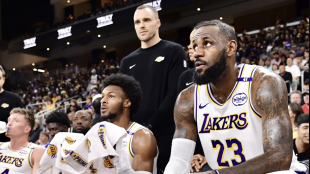 LeBron James and Bronny James on the bench of the Los Angeles Lakers.
