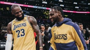 LeBron James, alongside Bronny James after his first NBA basket.
