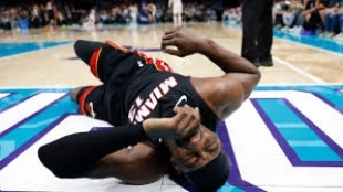 Adebayo exited injured after a hit from LaMelo Ball.